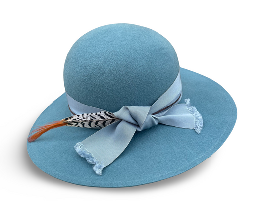 Smoky Blue Felt Swinger with matching grosgrain trim and a pheasant feather. 