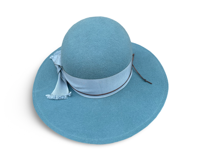 Smoky Blue Felt Swinger with matching grosgrain trim and a pheasant feather. 