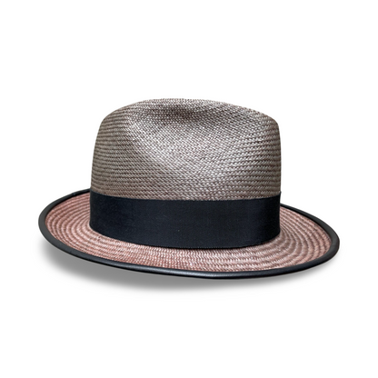 Gray Panama straw fedora with black leather piping on the brim and black grosgrain trim. Crown is 4" tall and brim is 2" wide