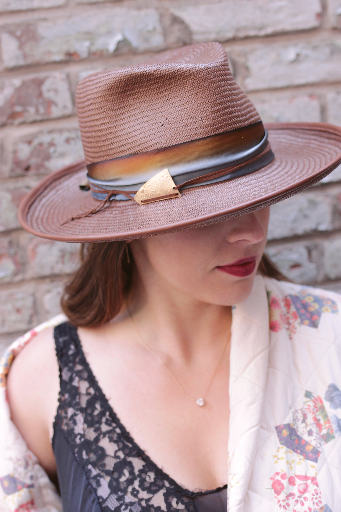 Blink Straw Fedora Hat on model. Blink Flange Fedora Hat, perfect for music festivals. Ombre silk trim with suede cord and gold hardware. 